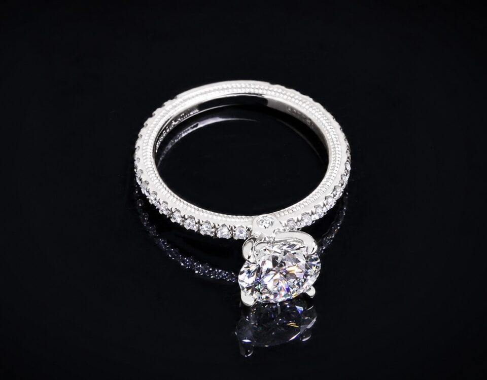 Verragio diamond engagement ring with a round centre diamond and diamond-set band.
