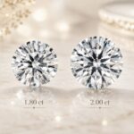 Side-by-side comparison of 1.80 carat and 2.00 carat round diamonds showing the difference in visible size.